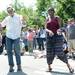 Mitch Ryder fans and Ann Arbor residents Jugo Kapetanovic and Karen Wallace-Shoultz dance as he performs during Sonic Lunch in downtown Ann Arbor on Thursday. Melanie Maxwell I AnnArbor.com